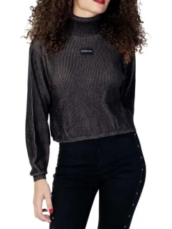 Pull en coton mélangé sapin uni avec une coupe évasée, un col roulé et à manches longues