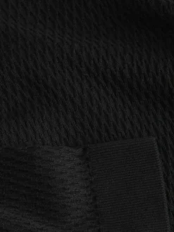 Pull en coton noir à coupe droite en maille avec un col rond