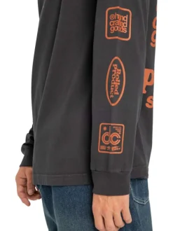 Pull en coton noir à imprimé fantaisie avec un col rond et des manches longues