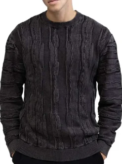 Pull en coton noir pourvu d'un col rond et de manches longues