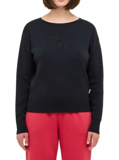 Pull en coton noir uni avec un col rond et des manches longues