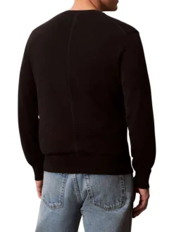 Pull en coton noir uni à col rond avec le mini logo brodé à la poitrine