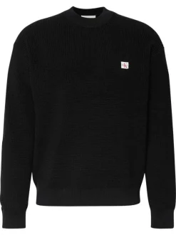 Pull en coton noir uni coupe ajustée col rond en maille gaufrée