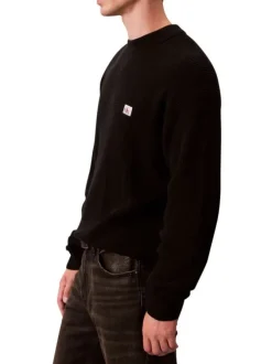 Pull en coton noir uni coupe ajustée col rond en maille gaufrée