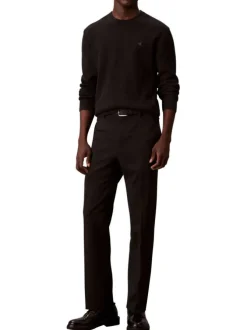 Pull en coton noir uni en maille avec un col rond et le mini logo brodé