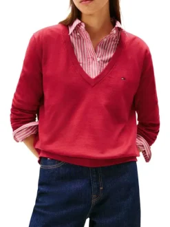 Pull en coton rose en maille tricotée pourvu d'un col v et de manches longues