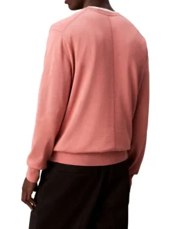 Pull en coton rose uni à col rond avec le mini logo brodé à la poitrine