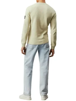 Pull en coton tilleul uni avec une coupe droite et un col rond