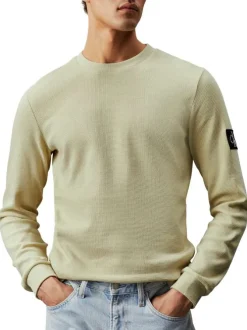 Pull en coton tilleul uni avec une coupe droite et un col rond
