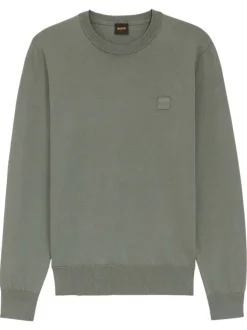 Pull en coton vert uni avec une coupe droite et un col rond