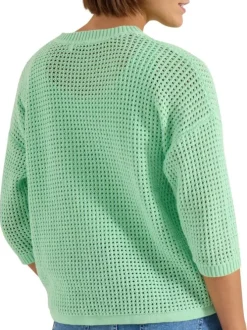 Pull en coton vert uni pourvu d'un cordon de serrage et de manches longues