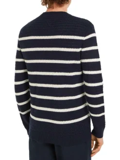 Pull en laine marine à rayures blanches avec une coupe droite et un col rond