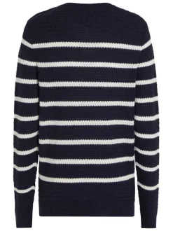 Pull en laine marine à rayures blanches avec une coupe droite et un col rond