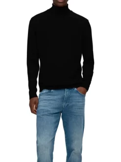 Pull en laine merinos noir uni avec une coupe droite et un col roulé