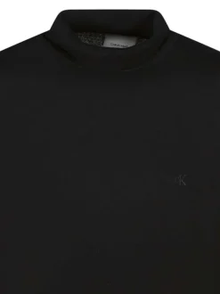 Pull en laine noir uni coupe ajustée col rond avec un logo brodé
