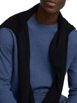 Pull fin en coton bleu indigo chiné avec une coupe droite et un col rond