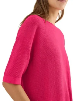 Pull fuchsia uni pourvu d'une coupe droite et de manches courtes