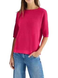 Pull fuchsia uni pourvu d'une coupe droite et de manches courtes