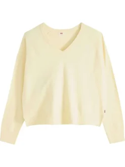 Pull jaune à coupe ajustée pourvu d'un col v et de manches longues