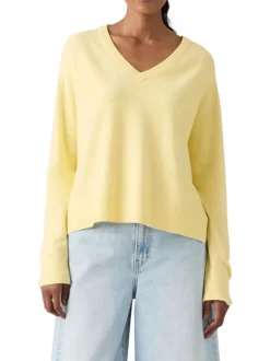 Pull jaune à coupe ajustée pourvu d'un col v et de manches longues