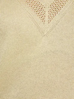 Pull jaune à coupe ample pourvu d'un col v arrondi et de manches courtes