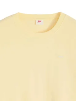 Pull jaune à coupe droite pourvu d'un col rond et de manches longues