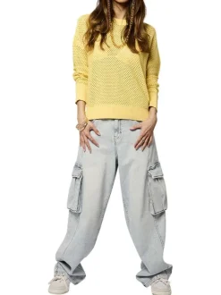 Pull jaune uni en maille ajourée à coupe oversize avec un col rond
