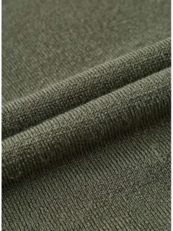Pull kaki uni avec une coupe longue un col rond et des manches bouffantes