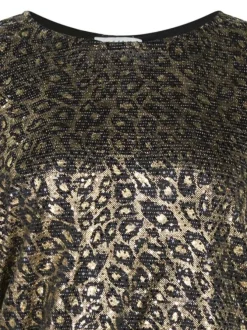 Pull léopard pailleté avec une coupe cropped et des manches longues