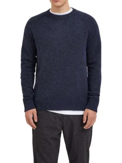Pull marine uni avec une coupe droite et un col rond en bord côte
