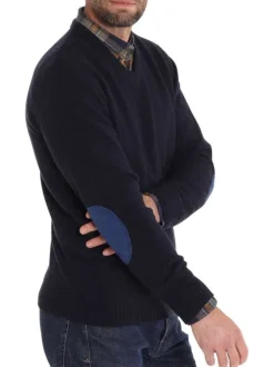 Pull marine uni avec une coupe droite, un col v et à manches longues
