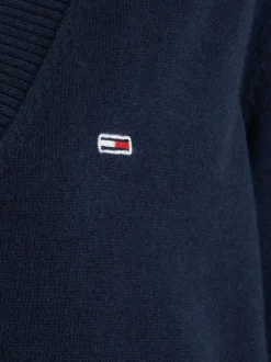 Pull marine uni coupe droite avec un col v et des manches longues