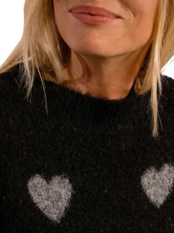 Pull noir avec imprimé coeurs gris à coupe droite et à col rond