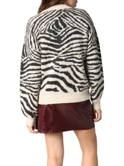 Pull noir et blanc zébré avec un col rond et des manches longues