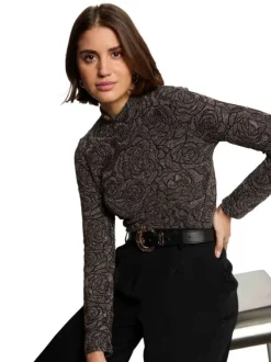 Pull noir floral coupe près du corps col montant et des manches longues