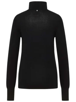 Pull noir uni avec un col roulé côtelé et des manches longues