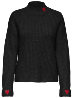 Pull noir uni avec une coupe droite à col montant et des manches longues