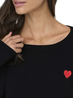 Pull noir uni avec une coupe droite et des manches longues