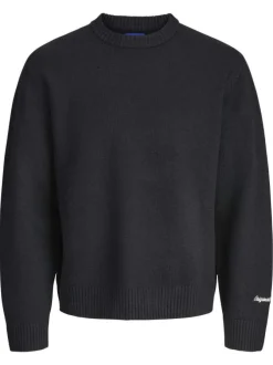 Pull noir uni en maille fine avec une coupe droite et un col rond