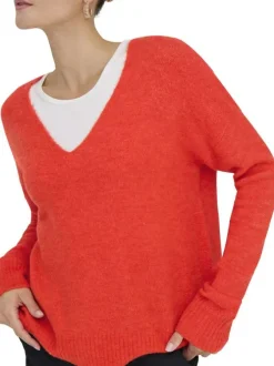 Pull orange uni avec une coupe droite et des manches longues