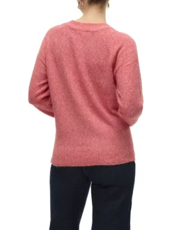Pull rose moucheté avec un col rond côtelé et des manches longues