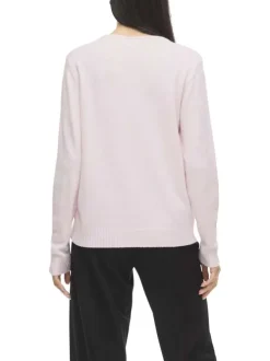 Pull rose uni avec une coupe droite et des manches longues