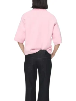 Pull rose uni en maille fine avec une coupe oversize et un col rond