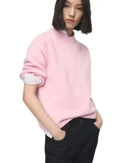 Pull rose uni en maille fine avec une coupe oversize et un col rond