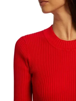Pull rouge uni avec une coupe ajustée, à manches longues et zip sur l'épaule