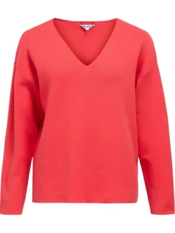 Pull rouge uni pourvu d'une coupe droite et de manches longues