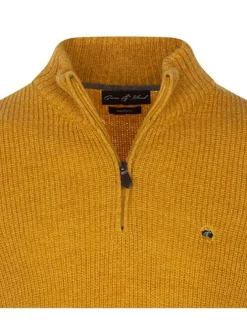 Pull uni moutarde à coupe droite avec un col montant et zippé et des manches longues