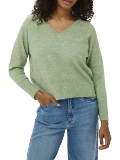 Pull vert uni avec une coupe ample avec un col v et des manches longues