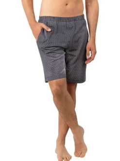 Pyjama court en coton bleu ciel à petits motifs avec un col v