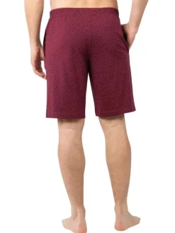 Pyjama court en coton bleu marine à col v avec des minis motifs sur le short